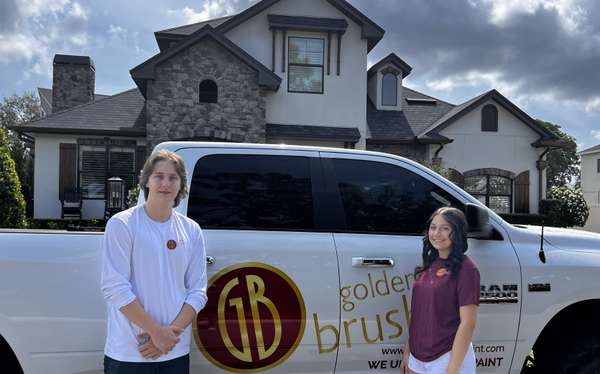 Golden Brush team in front of completed project